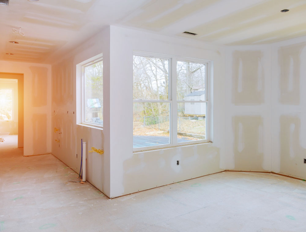 New home being constructed - Living room with sheetrock done and ready for painting