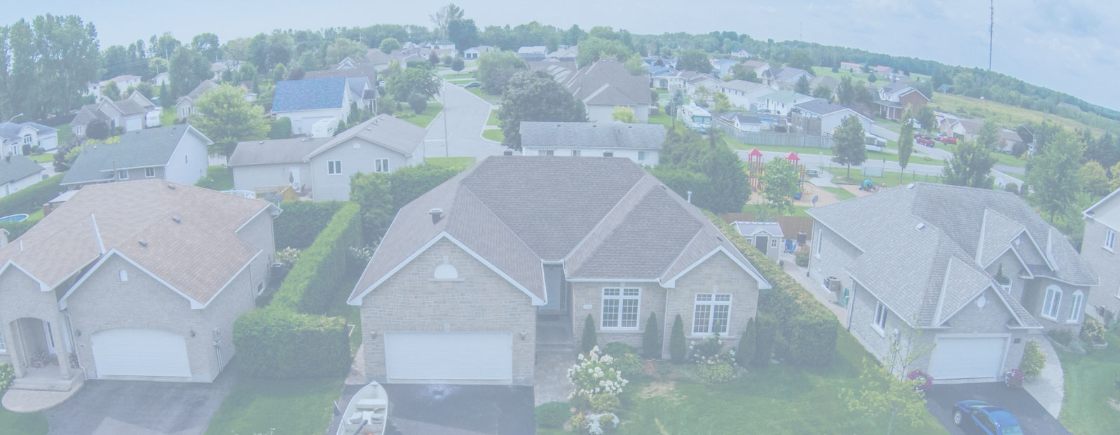 Aerial view of suburban neighborhood depicting a typical home inspection site on Long Island