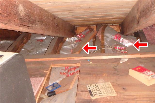 The insulation was installed backwards with the vapor barrier facing away from the heated sections of the house